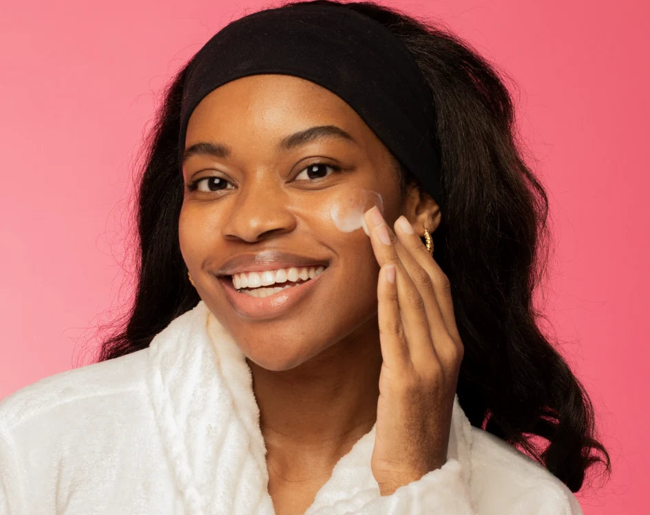 Woman applying skincare